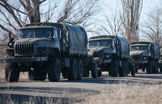 Ополченцы на востоке Украины начали вывод от линии соприкосновения тяжелого вооружения - ảnh 1